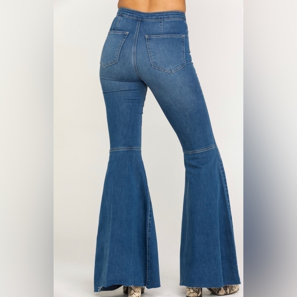 Free People High-Rise Flare Jeans in Medium Blue - Picture 4 of 9